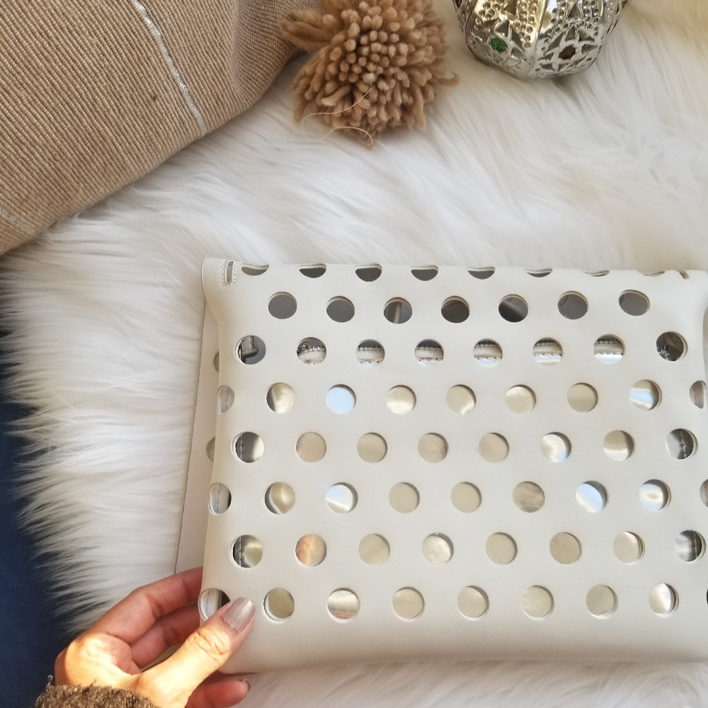 Nwot Perforated white leather clutch